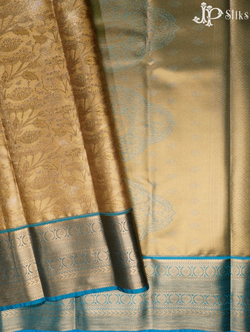 https://jpsilks.com/collections/art-silk-saree/products/sky-blue-and-gold-art-silk-saree-g301