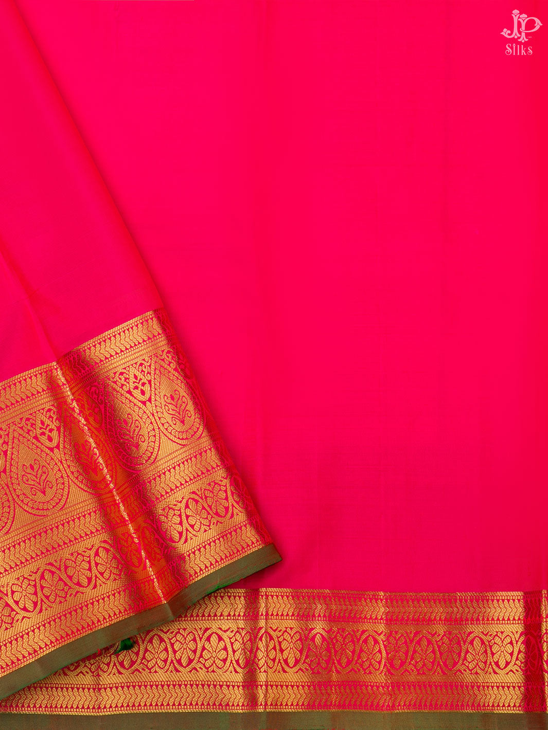 Bright pink saree with intricate gold border detailing from JP Silks for festive occasions
