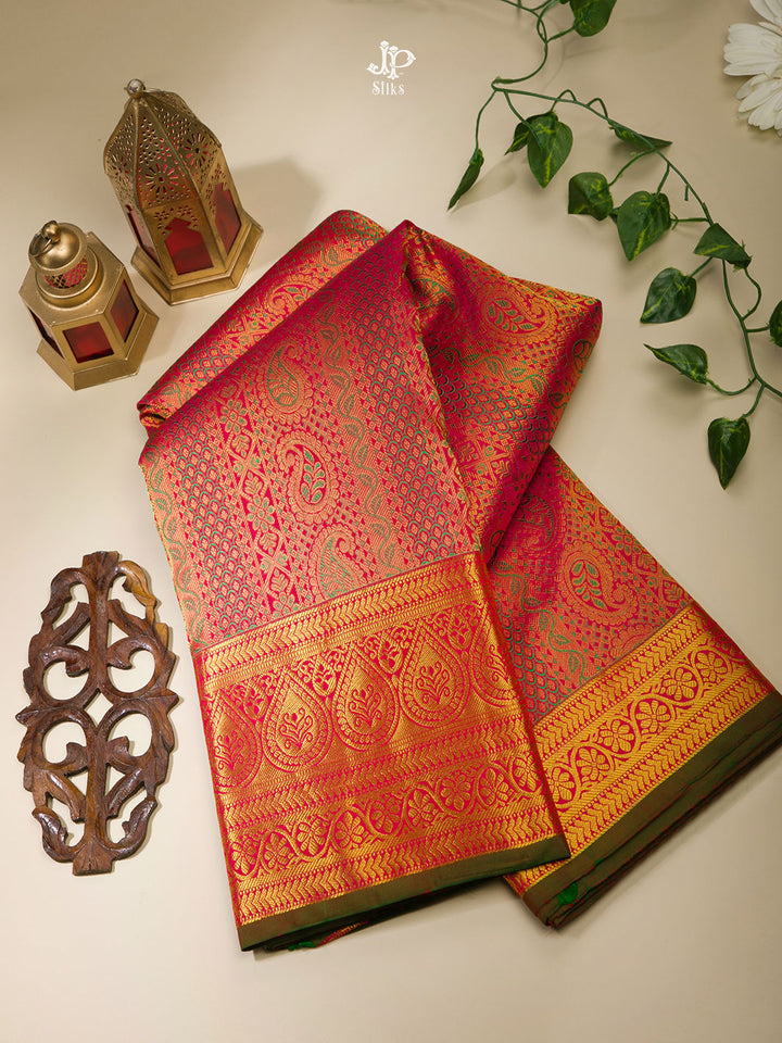 JP Silks Elegant Red Saree with Intricate Gold Weaving and Traditional Patterns